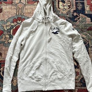 White Hollister zip up.